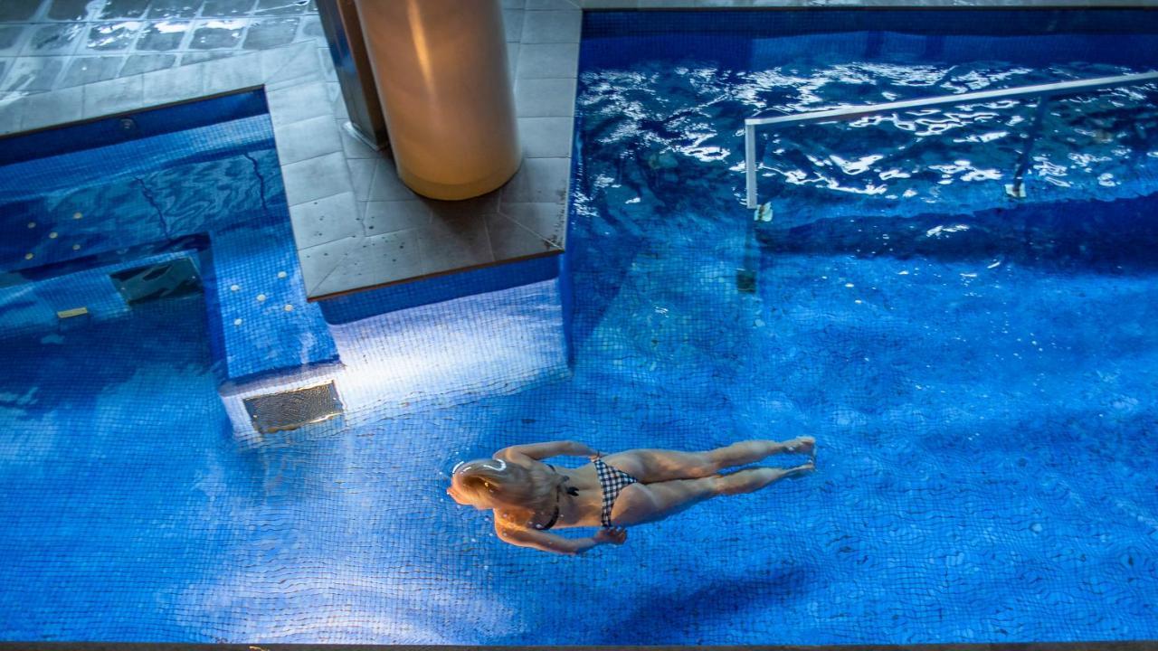 Sant Jordi Boutique Hotel Calella Kültér fotó The pool at the Atlantis Paradise Island