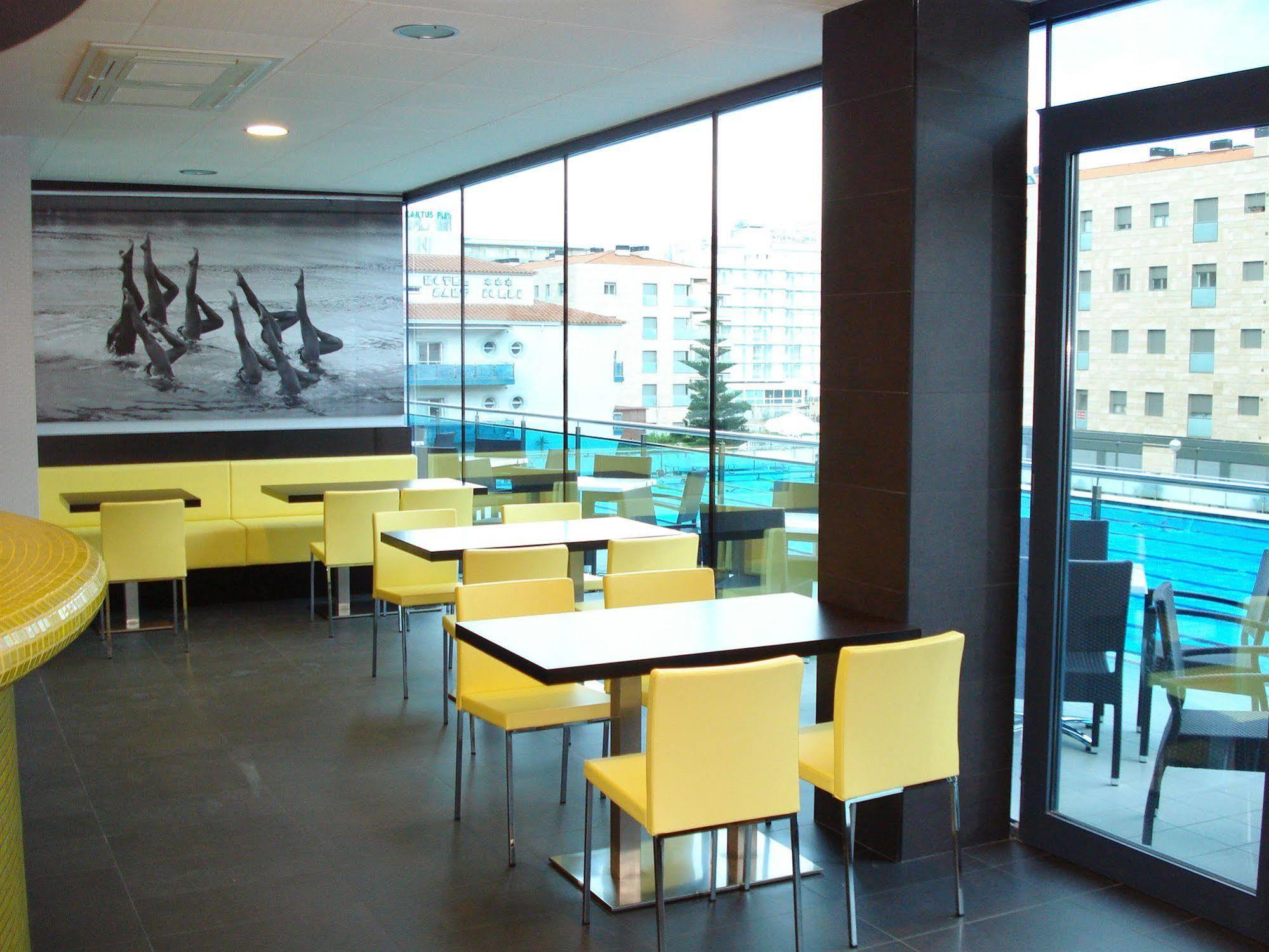 Sant Jordi Boutique Hotel Calella Kültér fotó Interior of a McDonald's restaurant in Prague, Czech Republic